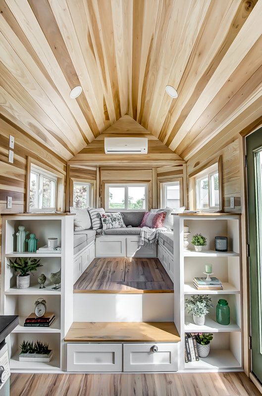 Tiny home with multiple floors and storage drawers